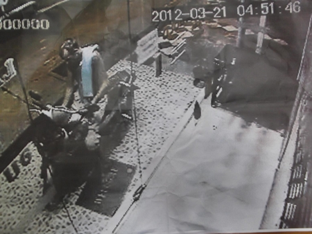 Security footage showing a Caucasian male allegedly stealing a motorcycle.